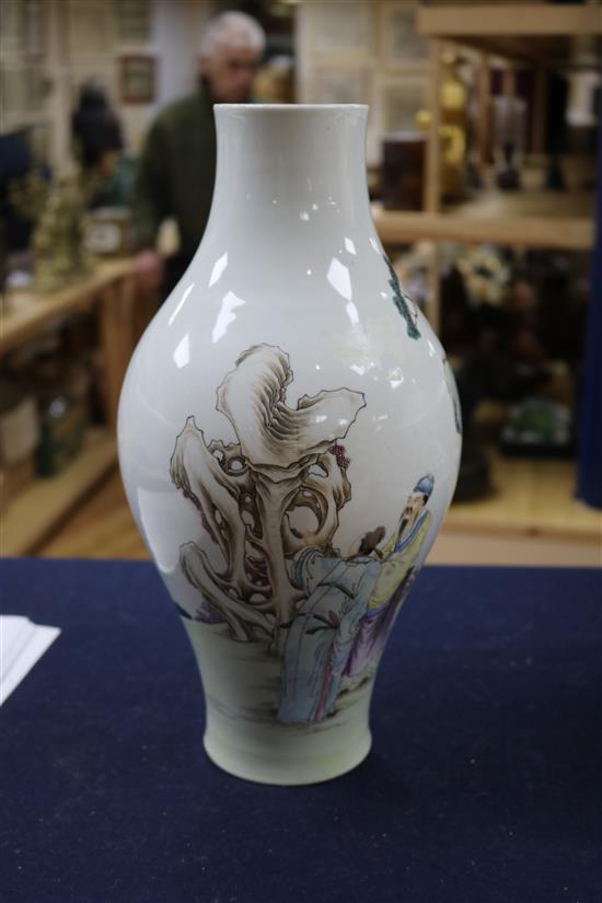 A Chinese famille rose baluster shaped vase, 20th century, height 33cm, wood stand